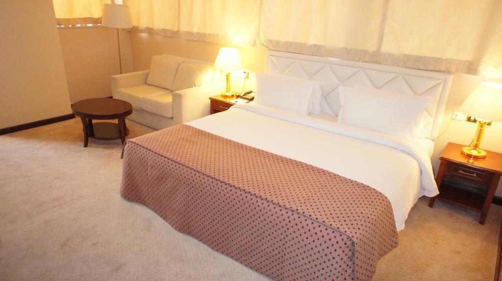 Gloria Hotel Doha Room photo