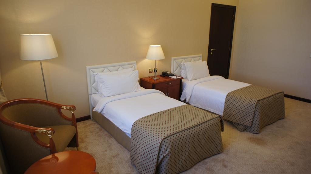 Gloria Hotel Doha Room photo
