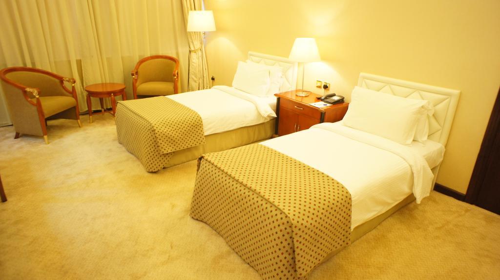 Gloria Hotel Doha Room photo